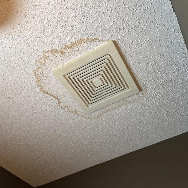 Ceiling air vent with surrounding water stain