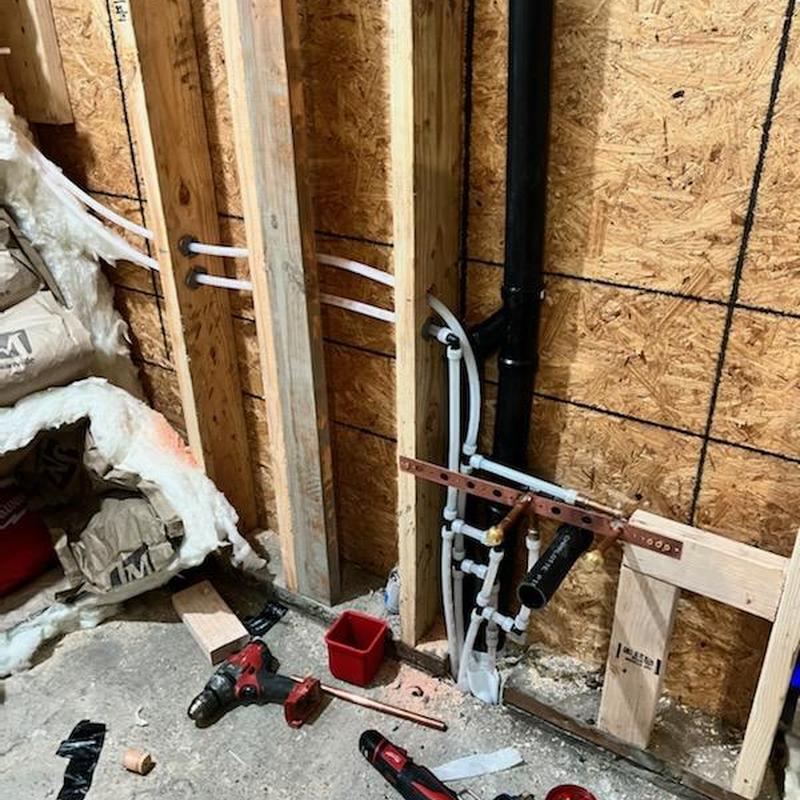 Vanity sink and shower pex water lines and drainage