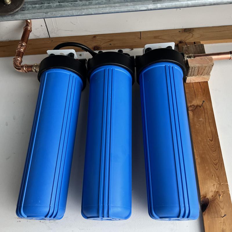 Three stage water filtration system with copper piping