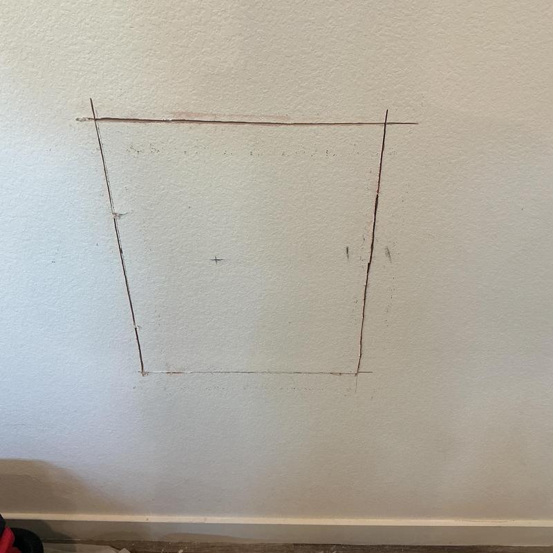 Drywall cutout for drain line access in wall Drywall cutout for drain line access in wall