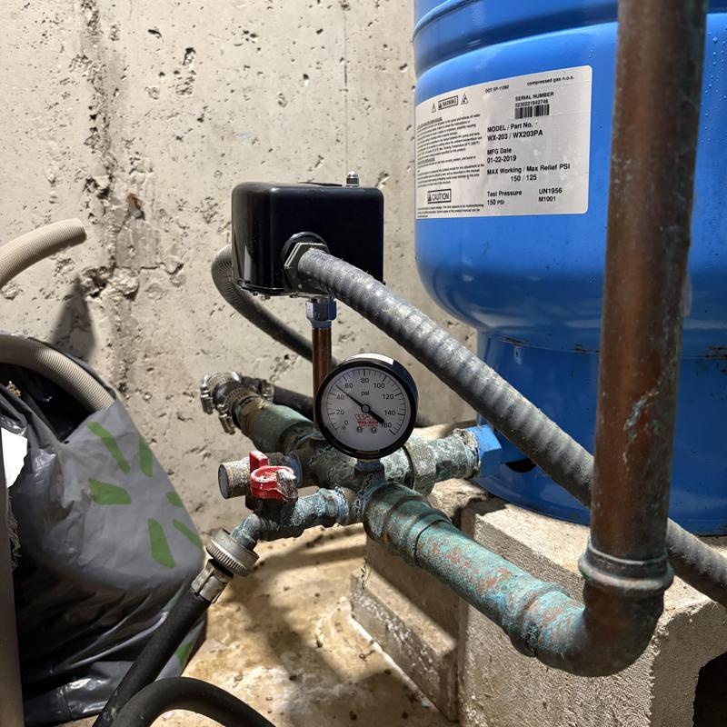 Well pressure switch and gauge with mineral buildup Well pressure switch and gauge with mineral buildup