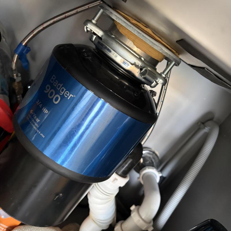 Garbage disposal unit tightening under sink plumbing Garbage disposal unit tightening under sink plumbing
