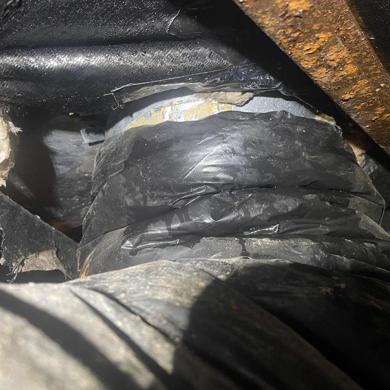 Duct system under residence with taped connections