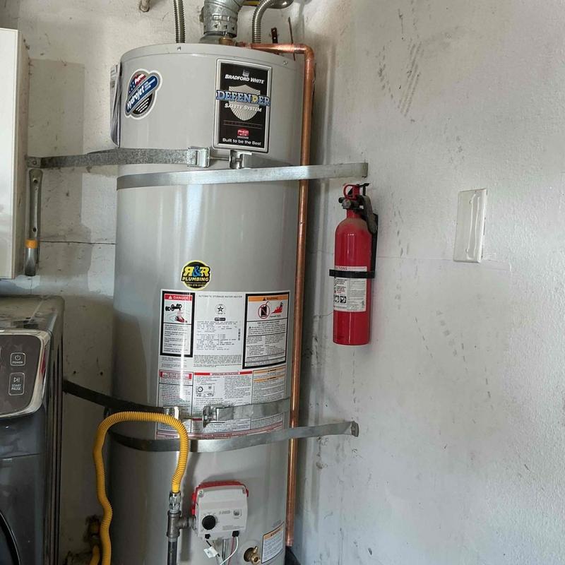 40-gallon water heater with plumbing installation