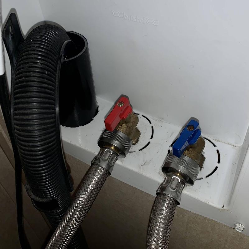 Laundry hoses with red and blue shutoff valves