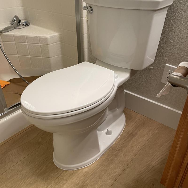 Toilet installation with new wax seal and supply line
