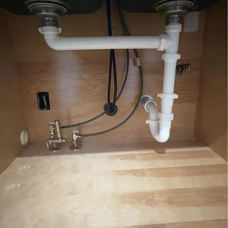 Kitchen sink drain pipes and water supply lines installation