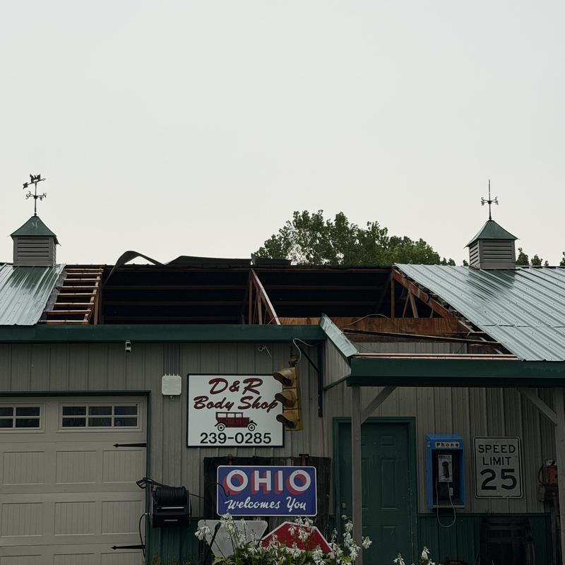 Barn metal roofing with severe damage and missing panels Barn metal roofing with severe damage and missing panels