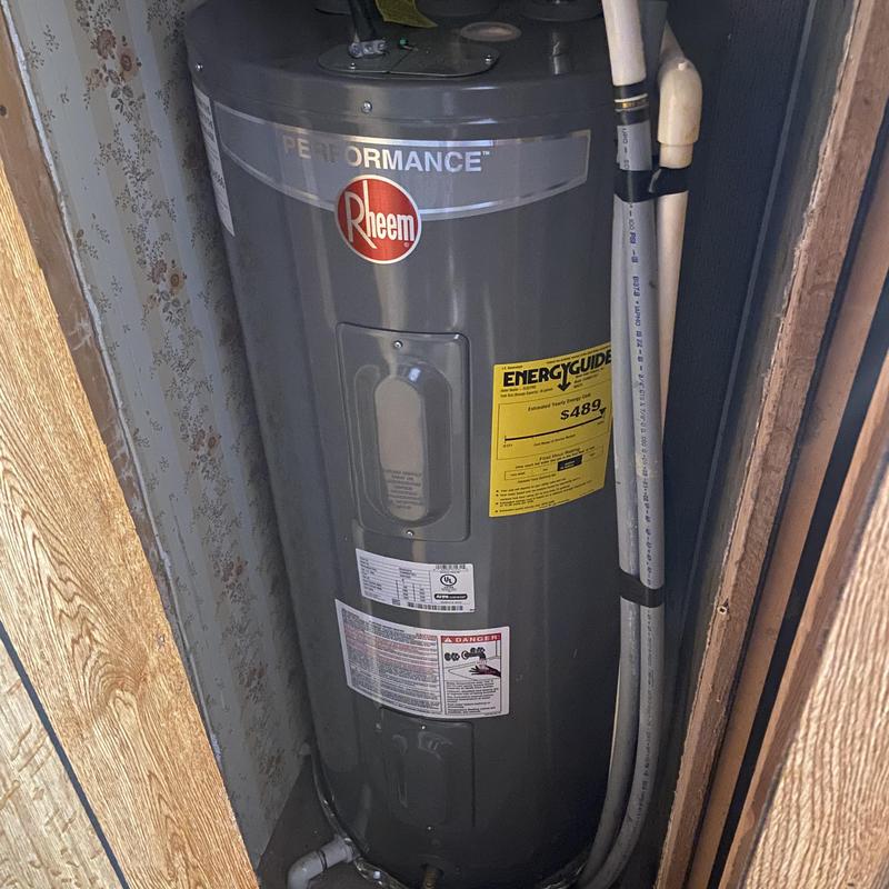 Water heater with polybutylene pipe under house