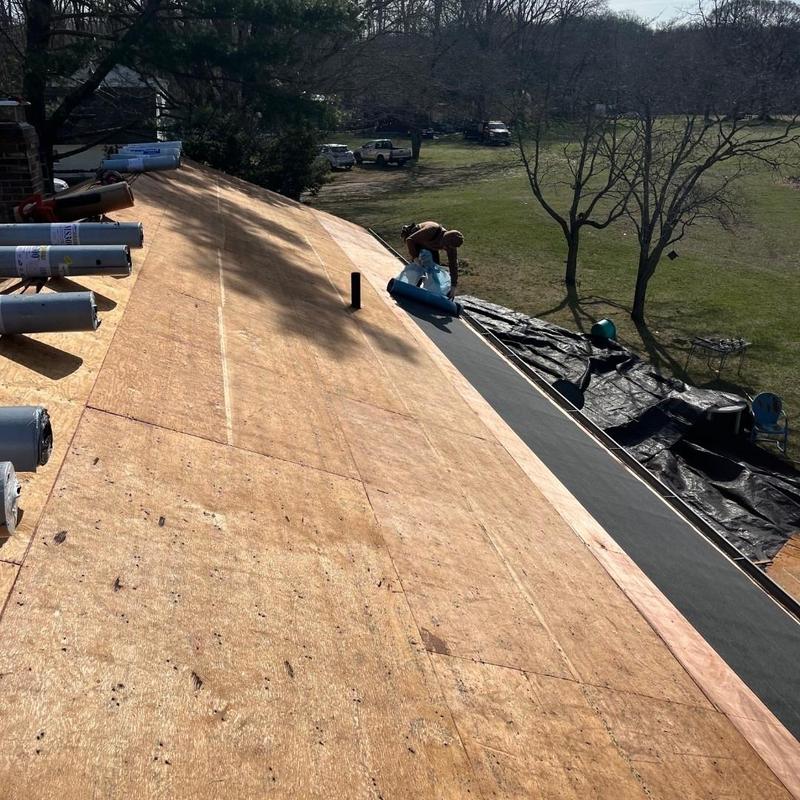 Roof decking preparation with ice and water shield installation