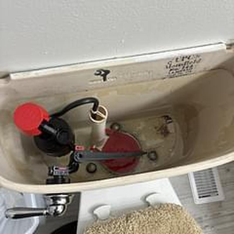 Toilet tank interior with rebuild components installed