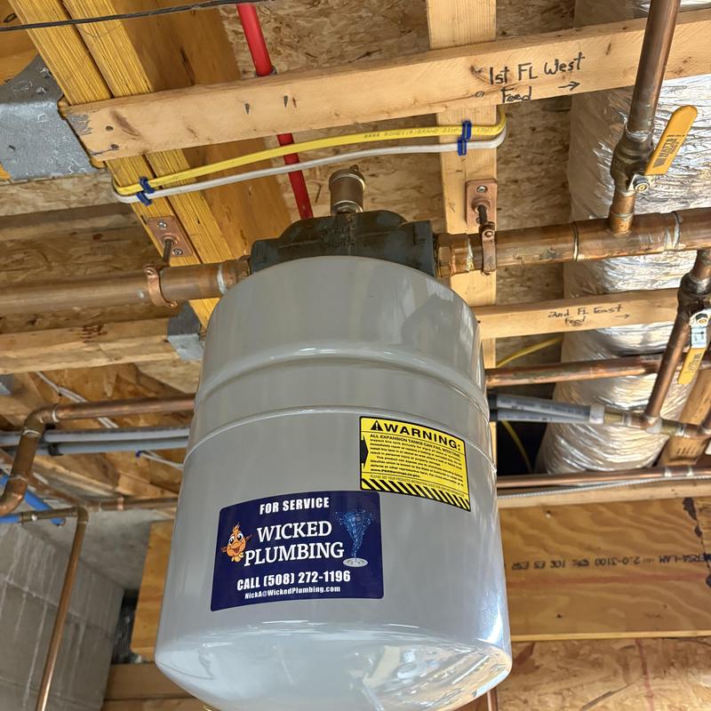 Expansion tank installation under boiler vent piping Expansion tank installation under boiler vent piping