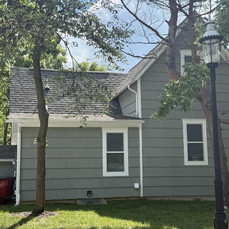 Asphalt shingle roof inspection on residential home Asphalt shingle roof inspection on residential home