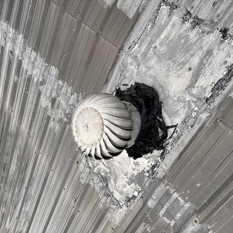 Metal roof turbine vent with seal damage and wear