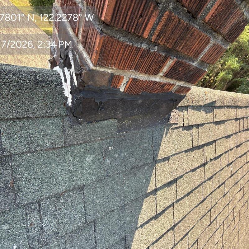 Chimney flashing and shingle roof inspection detail