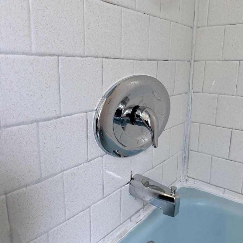 Shower valve and tub spout with tile wall installation Shower valve and tub spout with tile wall installation