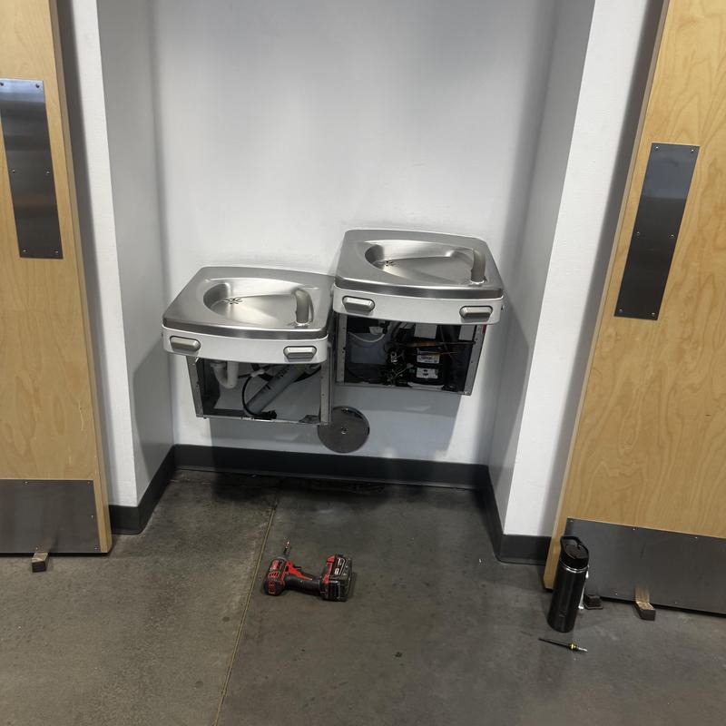 Commercial bottle filling water fountain installation in progress Commercial bottle filling water fountain installation in progress