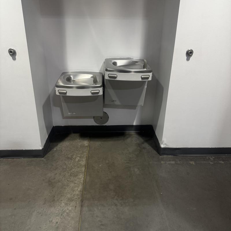 Commercial drinking fountain with bottle filling station installation Commercial drinking fountain with bottle filling station installation