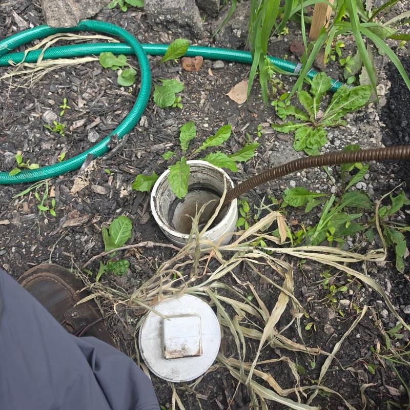 Sewer cleanout with cable obstruction removal tool