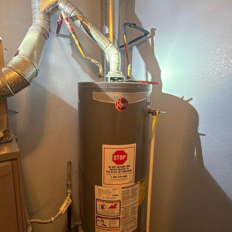 Water heater with gas line and venting corrections Water heater with gas line and venting corrections