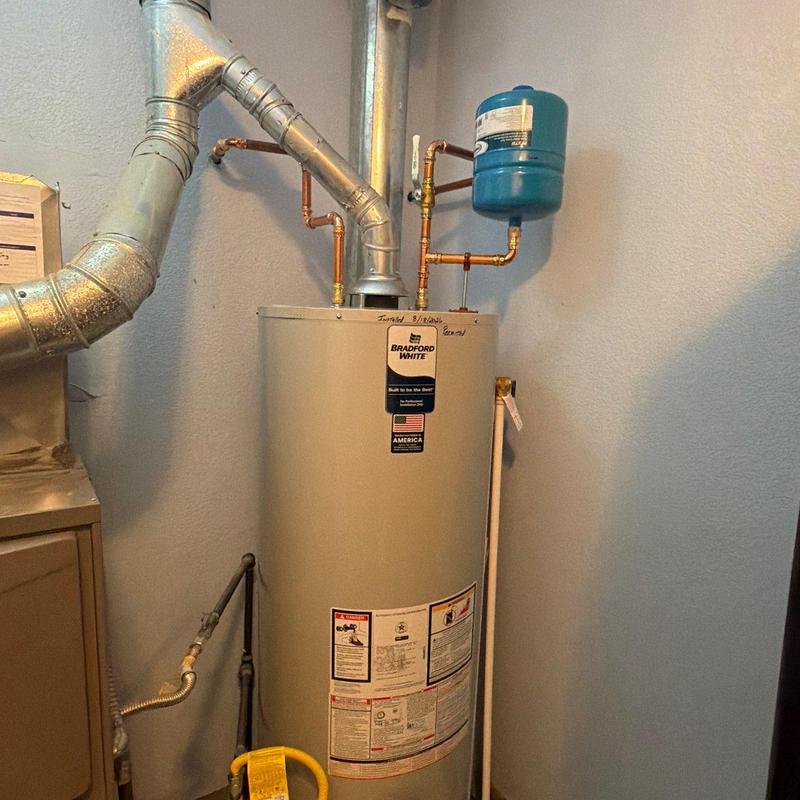 Water heater with venting and gas line upgrades Water heater with venting and gas line upgrades