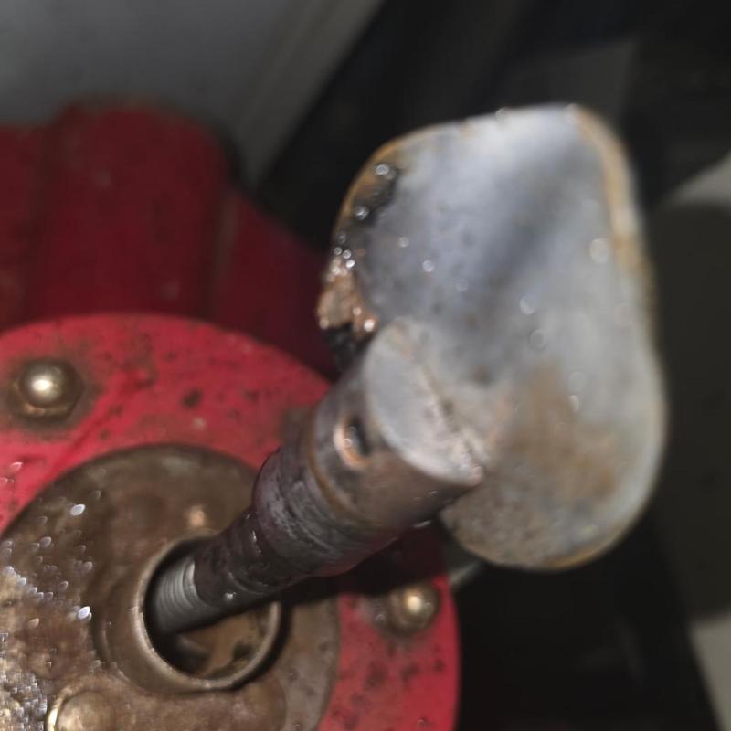 Water pump shaft with rust and corrosion buildup