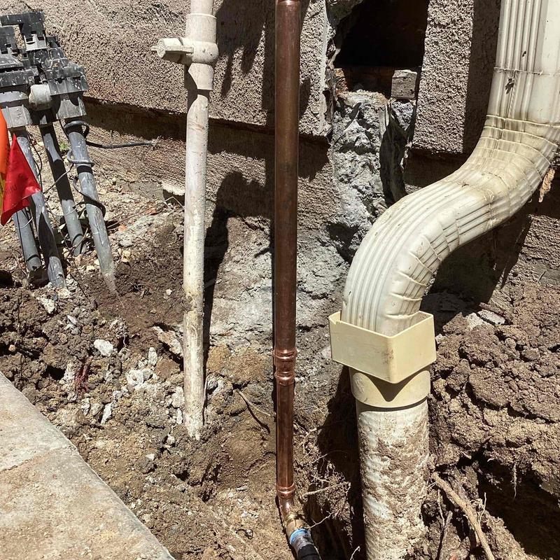 Copper water main pipe replacement near home entrance