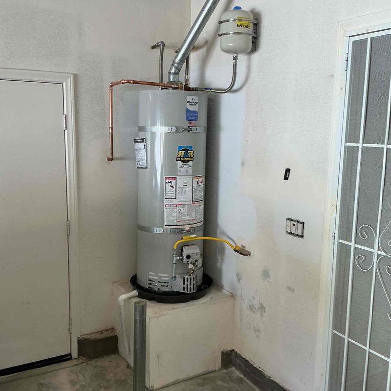 Water heater with new plumbing and safety components
