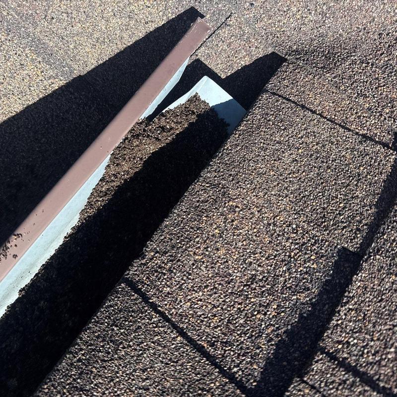 Roof flashing with granule loss and hail damage