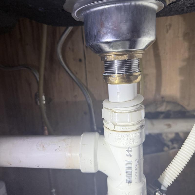 Kitchen sink drain pipe and fittings under counter Kitchen sink drain pipe and fittings under counter