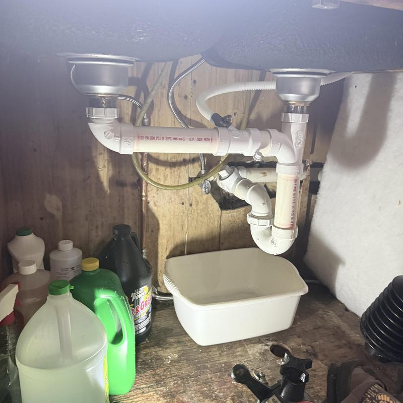 Kitchen sink drain pipes with rebuilt connections Kitchen sink drain pipes with rebuilt connections