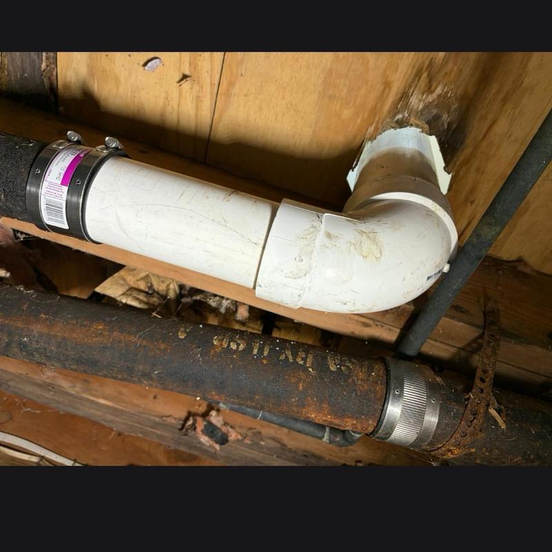 Toilet flange and PVC drain pipe with clamp repair