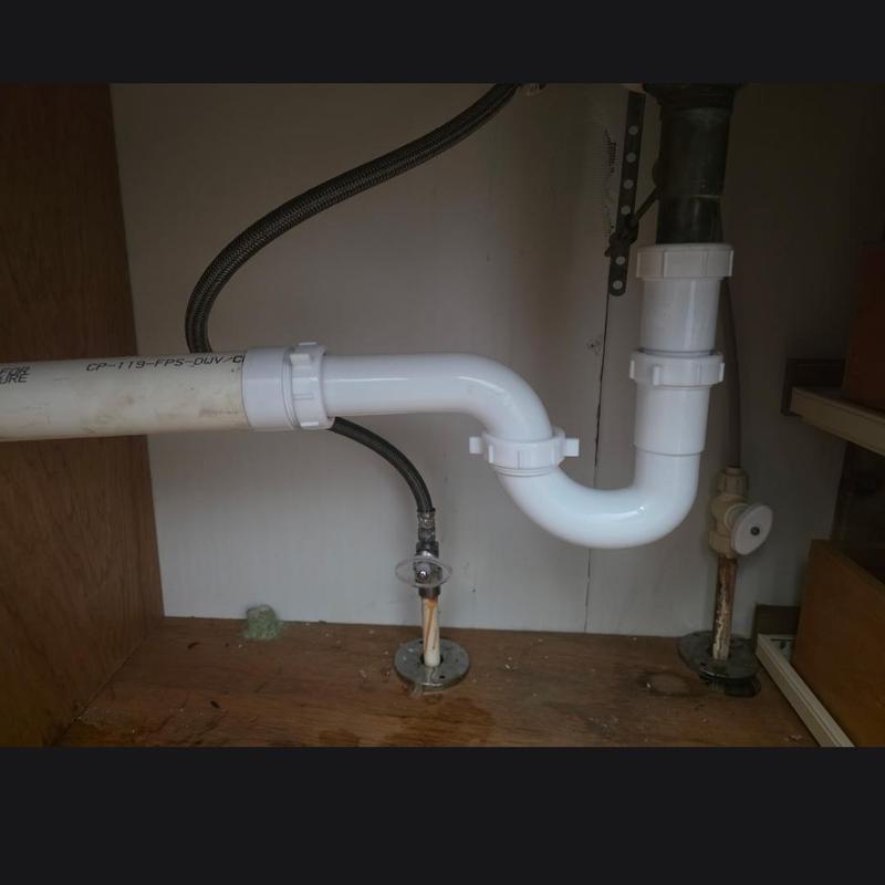 P-trap plumbing installation under bathroom vanity