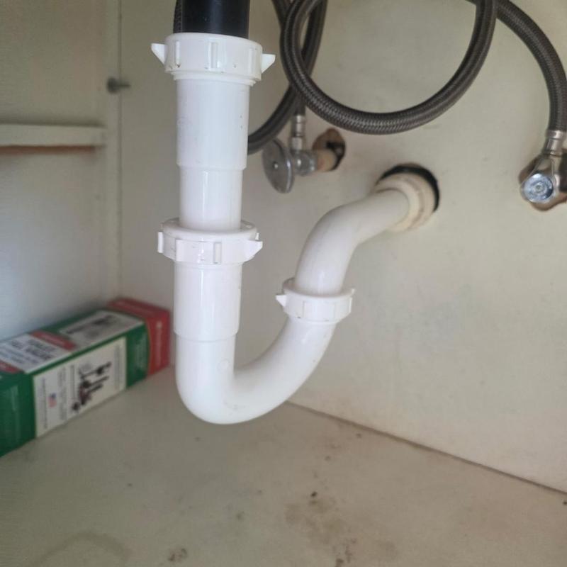 P trap plumbing installation under vanity sink