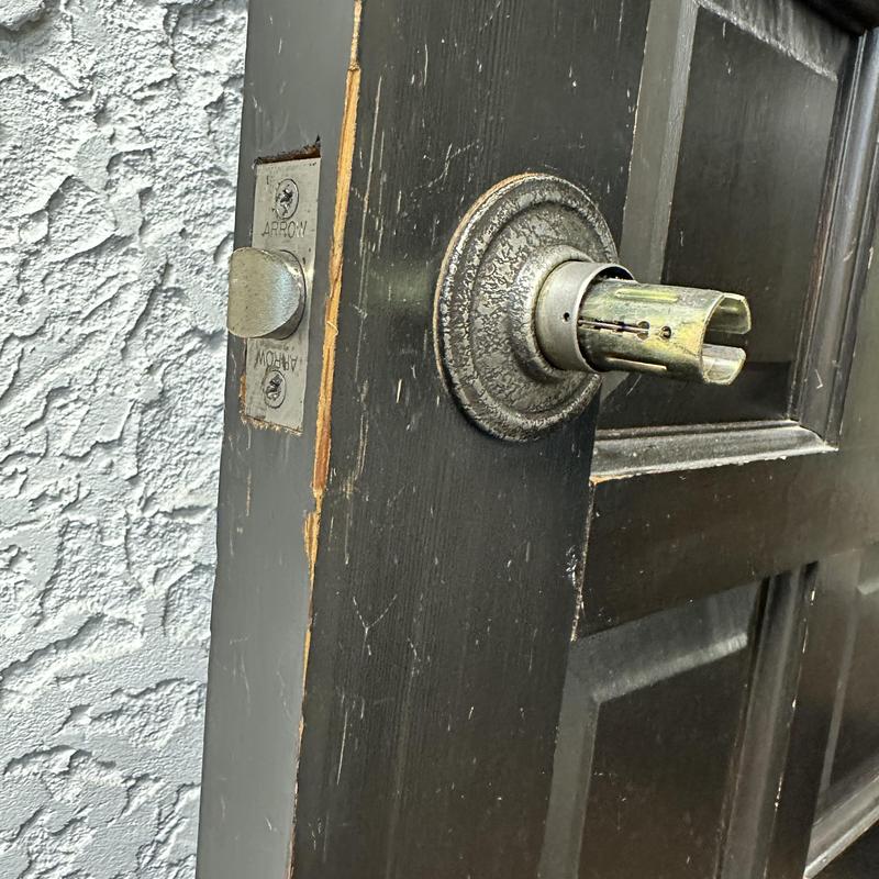 Office door lock cylinder without knob on black door Office door lock cylinder without knob on black door
