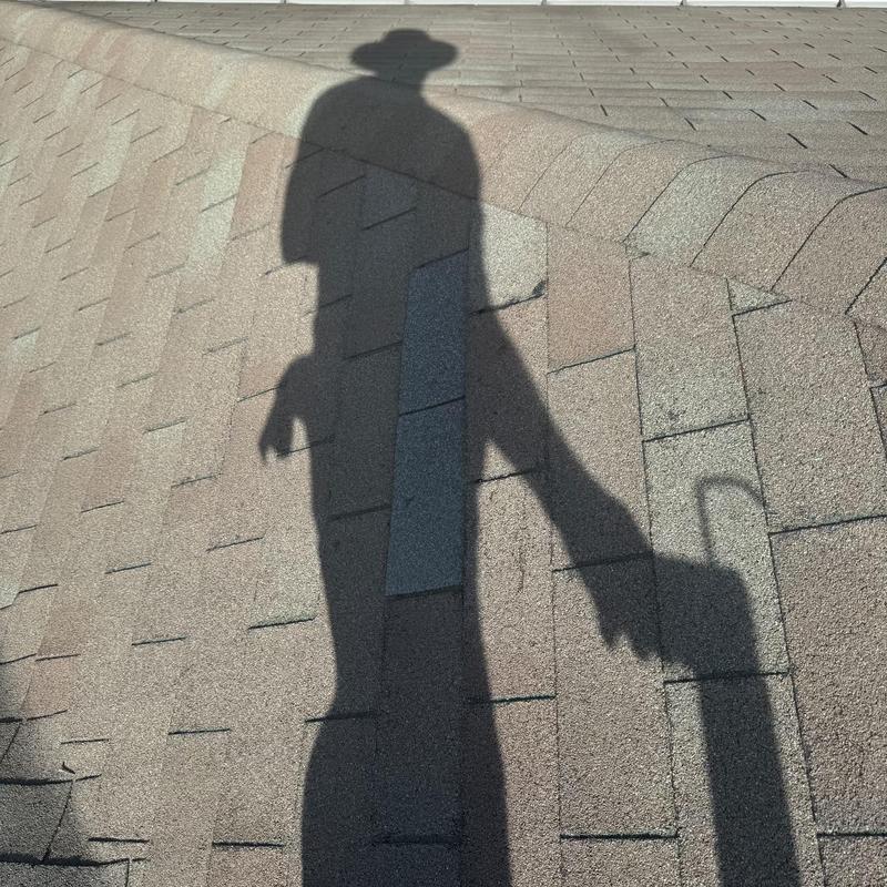 Three tab shingle roof with pipe boot shadow Three tab shingle roof with pipe boot shadow