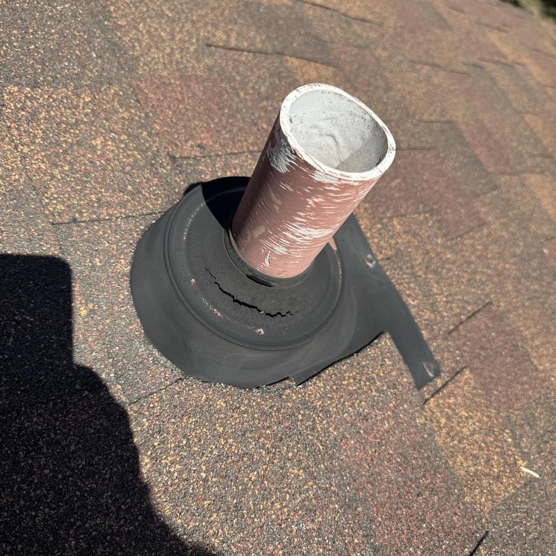 Dry rotted roof pipe boot with cracked rubber seal Dry rotted roof pipe boot with cracked rubber seal