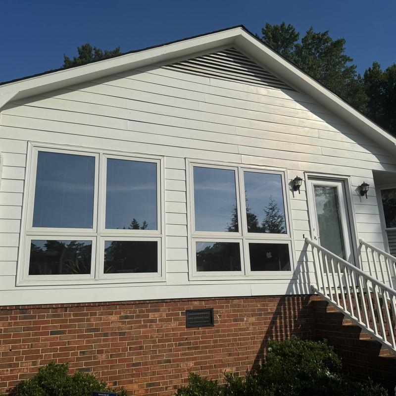 Window and door overhang area on house exterior Window and door overhang area on house exterior