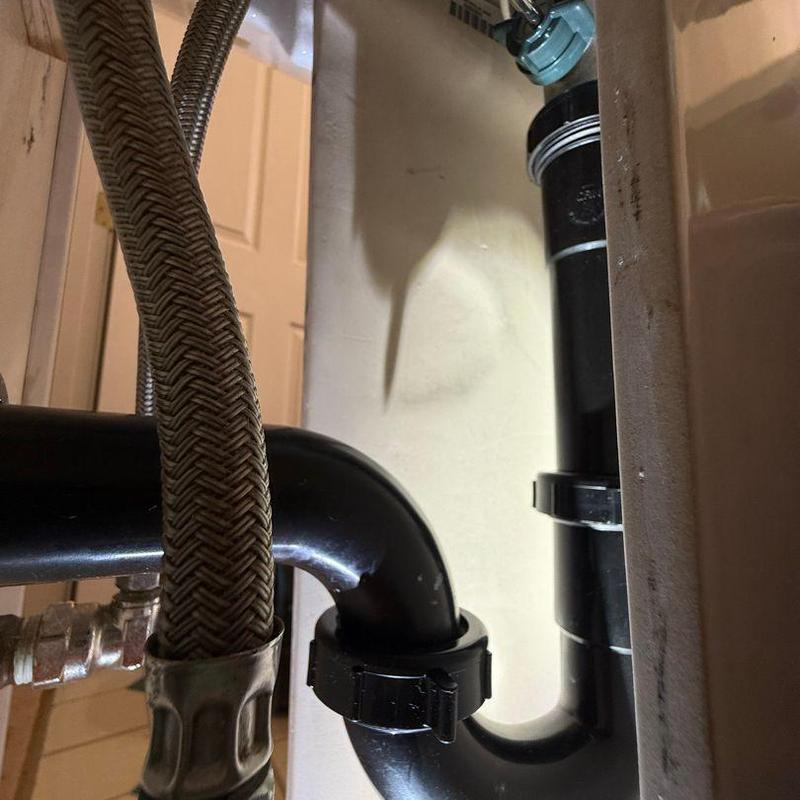 P-trap plumbing pipe with flexible water supply hose
