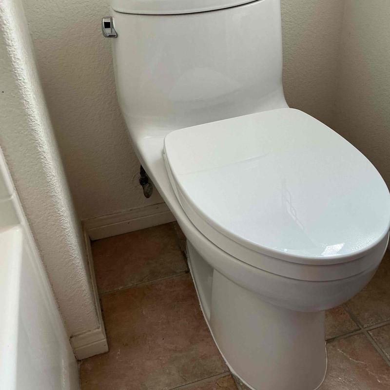 Toto toilet installed on bathroom floor tile