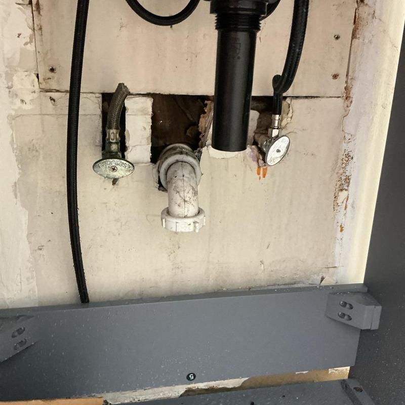 P trap drainage pipe under bathroom sink wall P trap drainage pipe under bathroom sink wall