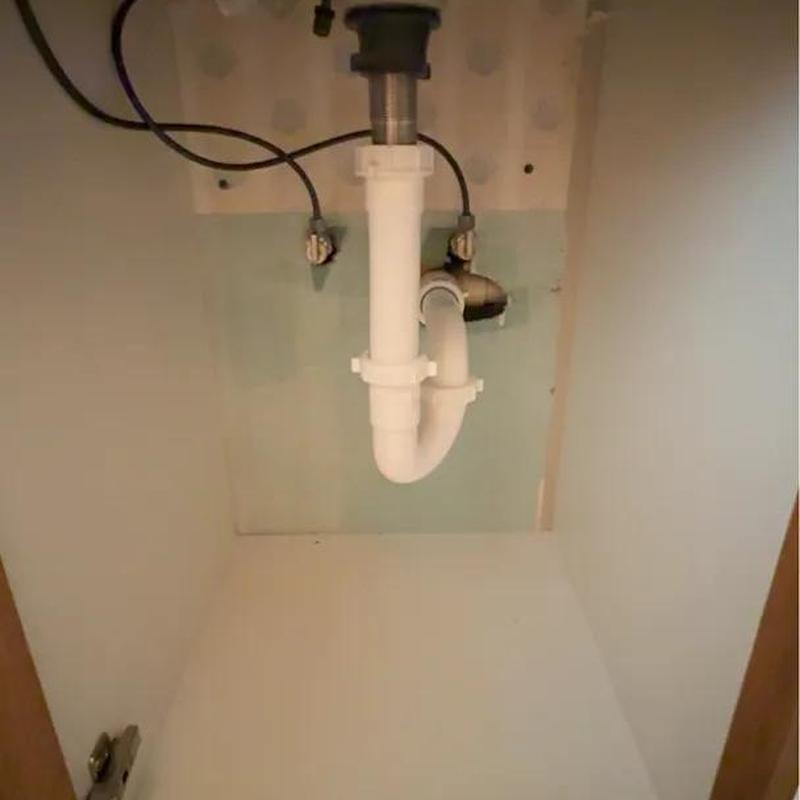 Bathroom sink drain pipe installation under cabinet
