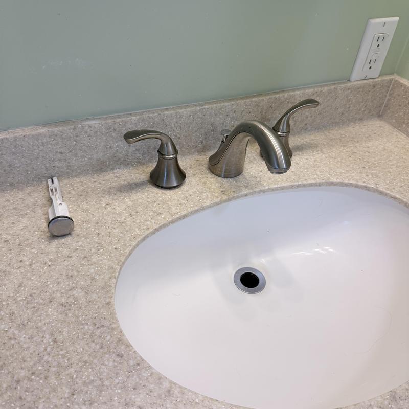 Bathroom faucet with new handle and countertop sink