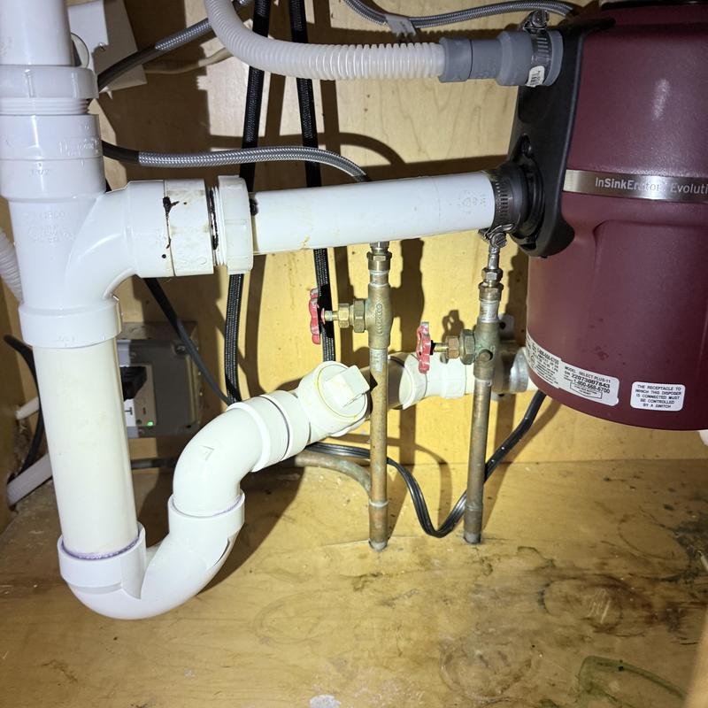 Kitchen sink piping and emergency stop valves installation