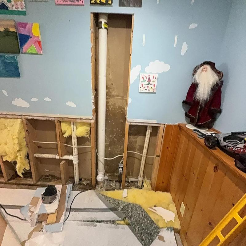 PVC drain pipe replacement with wall removed