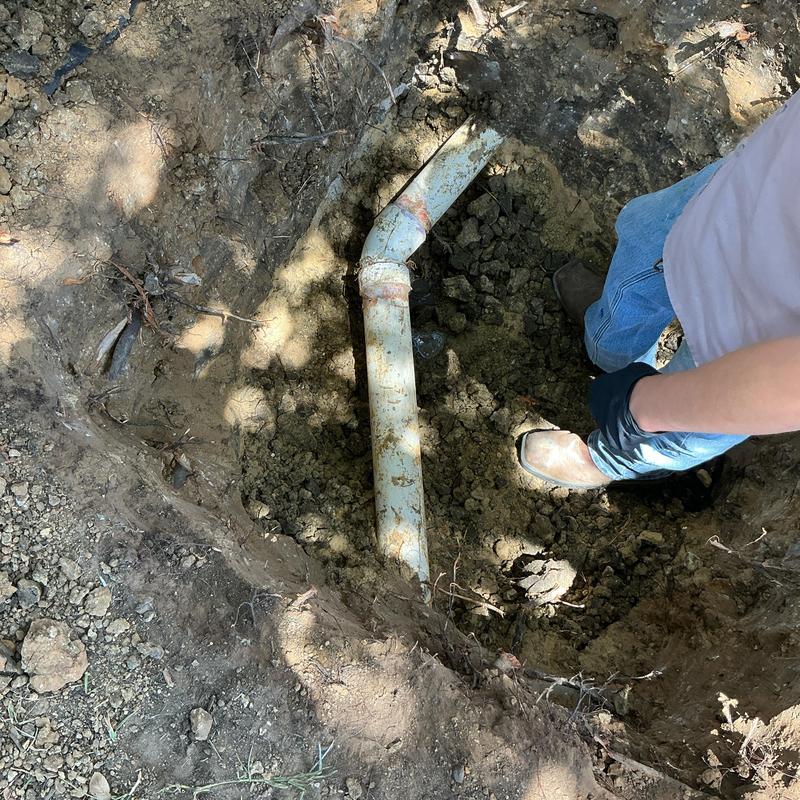 3-inch PVC 45-degree fitting in soil excavation