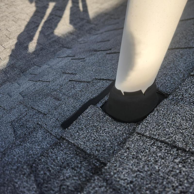 Plumbing vent collar with new roofing sealant on shingles
