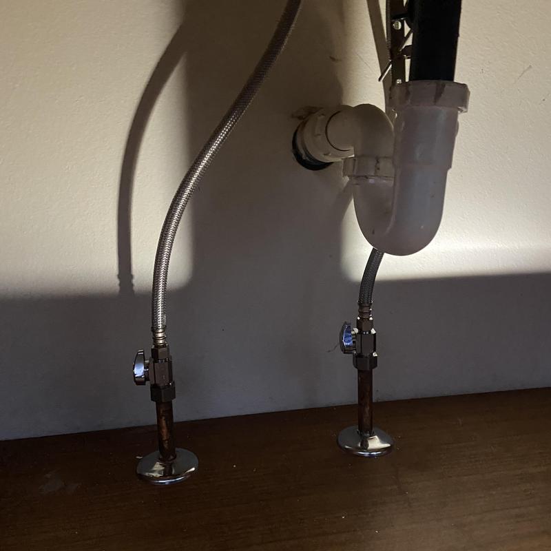 Bathroom sink supply lines and drain piping installation