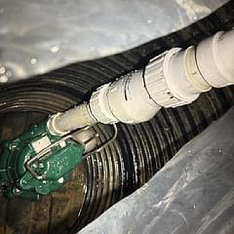 Zoeller M63 sump pump with discharge piping installed Zoeller M63 sump pump with discharge piping installed