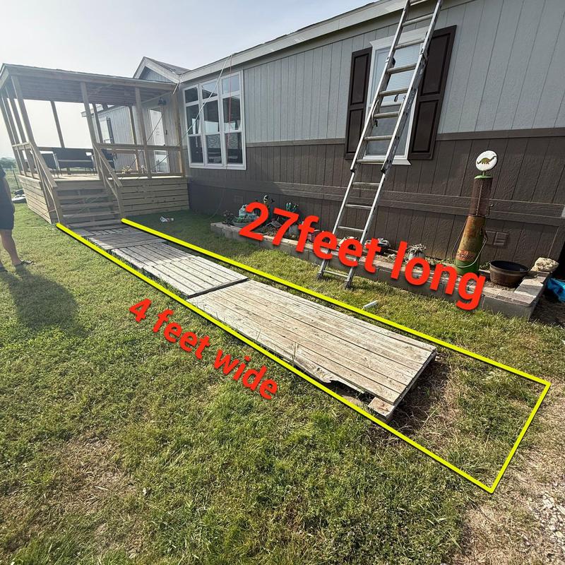 Wooden walkway with dimensions marked for concrete quote
